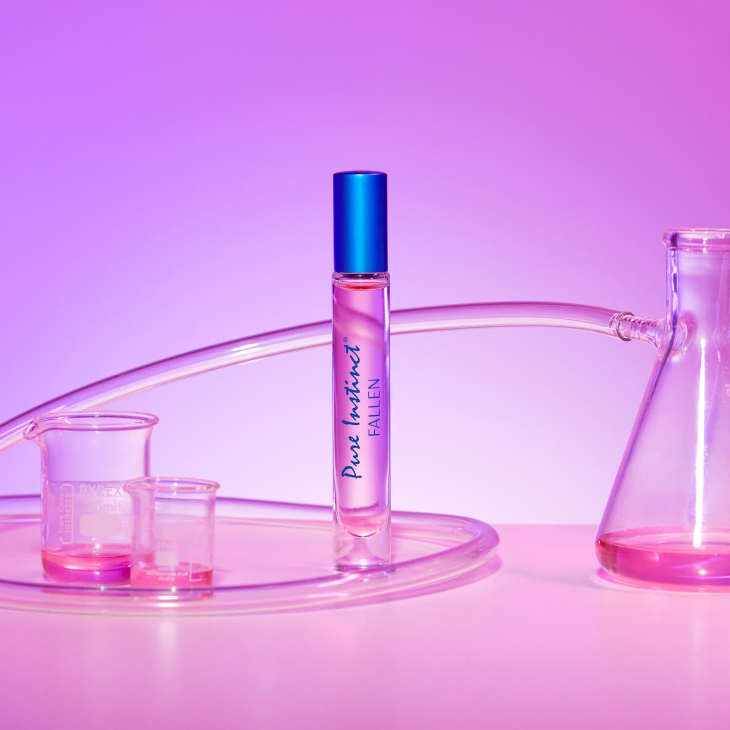 Pure Instinct Fallen perfume spray displayed among glass lab beakers and test tubes under purple lighting for a scientific and modern vibe